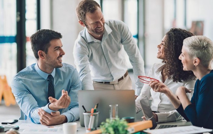 Professional marketers at one of the top lead generation companies working together to drive revenue through digital strategy.